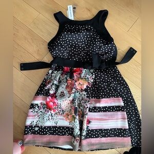 Rinascimento floral and polka dot mixed media dress with snap closure belt!
